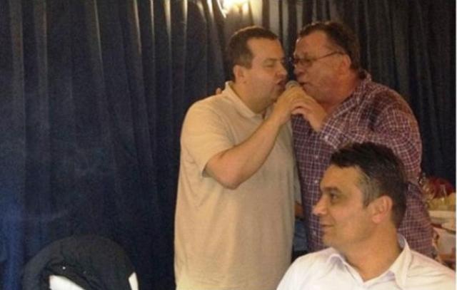 Држава гори а Дачић о државном трошку пева